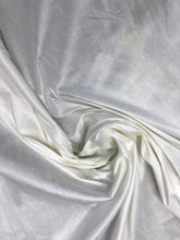 Ivory Shantung/Dupioni fabric. 54&quot; wide. Shantung fabric is unique blend makes this fabric soft and gives structure to dress.