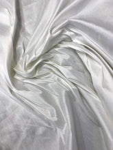 Ivory Shantung/Dupioni fabric. 54&quot; wide. Shantung fabric is unique blend makes this fabric soft and gives structure to dress.