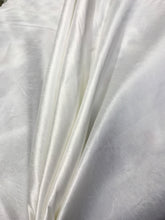 Ivory Shantung/Dupioni fabric. 54&quot; wide. Shantung fabric is unique blend makes this fabric soft and gives structure to dress.