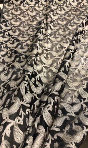 100% silk organza jaquard 45" wide   Beautiful black gold floral design     Sold by the yard