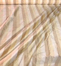 100% silk shantung stripe, 54&quot; wide. Beautiful ivory brownish yellow gold. Fabric sold by the yard.