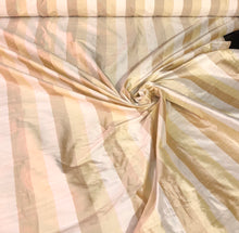 100% silk shantung stripe, 54&quot; wide. Beautiful ivory brownish yellow gold. Fabric sold by the yard.