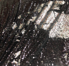 Reversible sequins fabric 54&quot; wide     Beautiful black silver color    Fabric sold by the yard