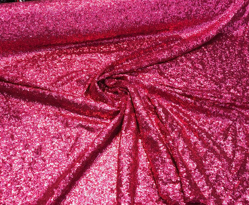 Solid sequins on mesh 52" wide    Top of the line sequins beautiful fusia color sequin fabric sold by the yard