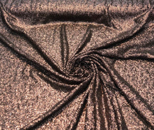 Solid sequins fabric on mesh 52&quot; wide    Top of the line quality  beautiful brown color sequins of mesh fabric sold by the yard
