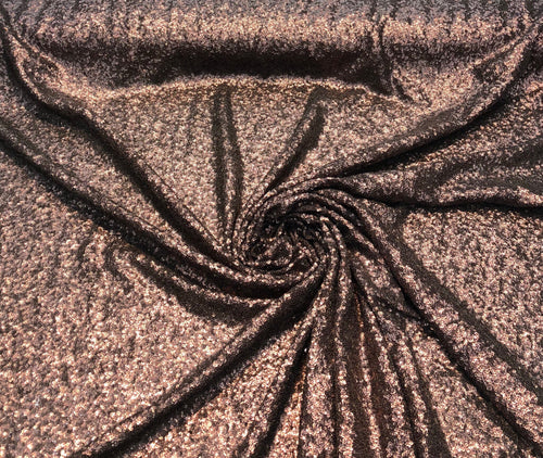 Solid sequins fabric on mesh 52" wide    Top of the line quality  beautiful brown color sequins of mesh fabric sold by the yard