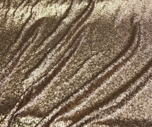 Solid sequins fabric on mesh 52&quot; wide    Top of the line quality beautiful gold color sequins on black mesh fabric sold by the yard