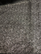 Black sequins on swirl meah fabric 52&quot; wide   Fabric sold by the yard