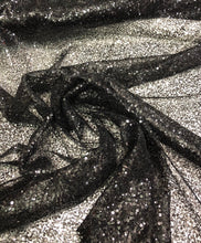 Black sequins on swirl meah fabric 52&quot; wide   Fabric sold by the yard