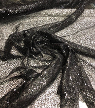 Black sequins on swirl meah fabric 52&quot; wide   Fabric sold by the yard