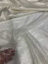 Ivory sequins on swirl mesh fabric 52&quot; wide    Fabric sold by the yard