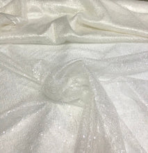 Ivory sequins on swirl mesh fabric 52&quot; wide    Fabric sold by the yard