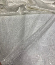 Ivory sequins on swirl mesh fabric 52&quot; wide    Fabric sold by the yard