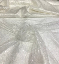 Ivory sequins on swirl mesh fabric 52&quot; wide    Fabric sold by the yard