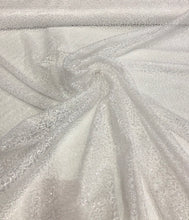 White sequins on sheer swirl mesh 52&quot; wide    Sequins fabric sold by the yard