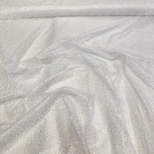 White sequins on sheer swirl mesh 52&quot; wide    Sequins fabric sold by the yard