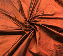 Silk taffeta 54&quot; wide    Beautiful burnt orange color silk taffeta fabric sold by the yard