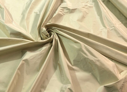 Champagne gold silk taffeta 54" wide    Beautiful iridescent champagne gold color silk taffeta fabric sold by the yard