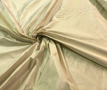 Champagne gold silk taffeta 54&quot; wide    Beautiful iridescent champagne gold color silk taffeta fabric sold by the yard