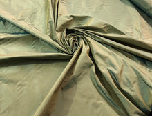 Silk taffeta 54&quot; wide    Beautiful iridescent green gold silk taffeta fabric sold by the yard