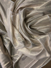 Silk chiffon 54&quot; wide     Matalic gold pinstripe silk chiffon fabric sold by the yard