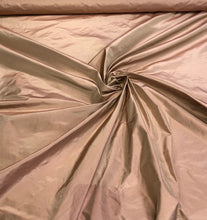 Silk taffeta 54&quot; wide    Beautiful light pumpkin gold color silk taffeta, you can also call it rose gold fabric sold by the yard