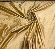 Silk taffeta 54&quot; wide     Beautiful iridescent antique gold color ailk taffeta fabric sold by the yard