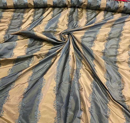 Silk taffeta 54" wide    Beautiful teal blue with gold jaquard stripe silk taffeta fabric sold by the yard