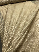 100% silk organza cross embroidery 54&quot; wide     Beautiful light gold shade         Sold by the yard