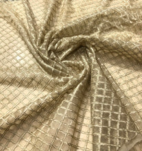 100% silk organza cross embroidery 54&quot; wide     Beautiful light gold shade         Sold by the yard