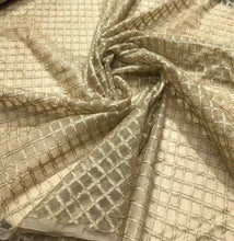 100% silk organza cross embroidery 54&quot; wide     Beautiful light gold shade         Sold by the yard