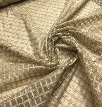 100% silk organza cross embroidery 54&quot; wide     Beautiful light gold shade         Sold by the yard