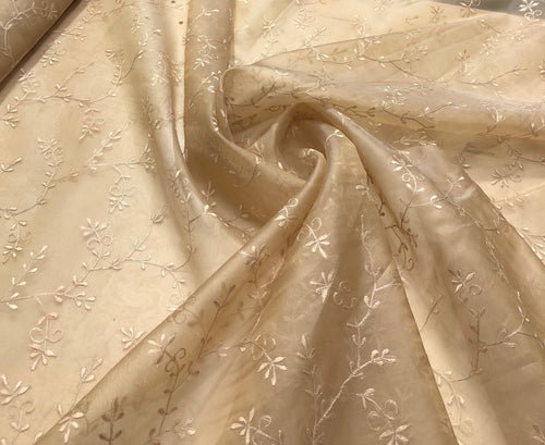 100% silk organza floral embroidery 54" wide   Beautiful gold color     Sold by the yard