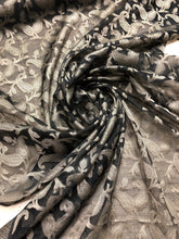 100% silk organza jaquard 45&quot; wide   Beautiful black gold floral design     Sold by the yard