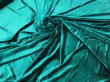Strech velvet 60&quot; wide      Beautiful bottle green color    Fabric sold by the yard