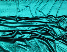 Strech velvet 60&quot; wide      Beautiful bottle green color    Fabric sold by the yard