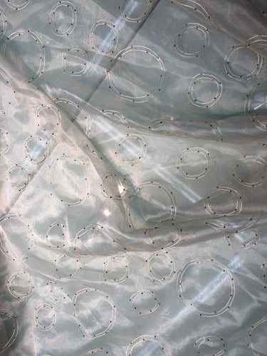 Ivory organza cirlce embroidery with beads 60" wide    Beautiful ivpry color    Fabric sold by the yard