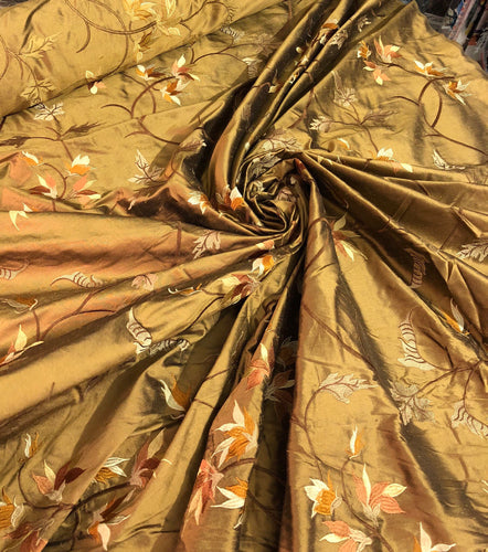 Silk shantung 54" wide    Beautiful bronze color floral embroidery silk shantung fabric sold by the yard