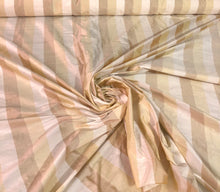 100% silk shantung stripe, 54&quot; wide. Beautiful ivory brownish yellow gold. Fabric sold by the yard.