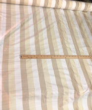 100% silk shantung stripe, 54&quot; wide. Beautiful ivory brownish yellow gold. Fabric sold by the yard.
