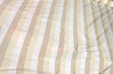 100% silk shantung stripe, 54&quot; wide. Beautiful ivory brownish yellow gold. Fabric sold by the yard.