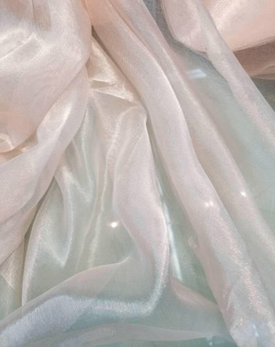Metallic  tissue organza pinkish ivory color  100% Silk Organza 45" wide fabric sold by the yard  Usable for Apparel and interior designing.
