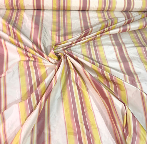100% silk taffeta stripe 54" wide    Beautiful pink yellow white color      Fabric sold by the yard
