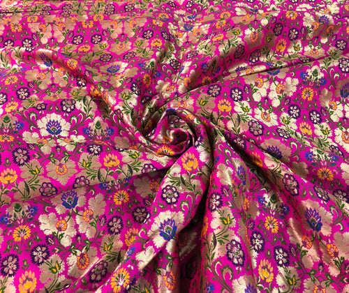 Jaquard floral brocade 44" wide   Beautiful fusia pink floral brocade fabric sold by the yard   Useable for apparel and interior decore.....