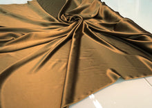 Silk charmouse 54&quot; wide    Beautiful bronze color silk charmouse fabric sold by the yard