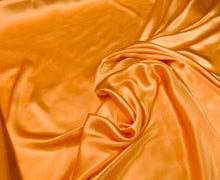 Silk charmouse 54&quot; wide    Beautiful soft  orange color silk satin charmeuse fabric sold by the yard