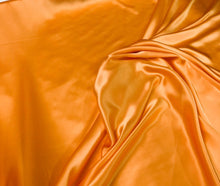 Silk charmouse 54&quot; wide    Beautiful soft  orange color silk satin charmeuse fabric sold by the yard