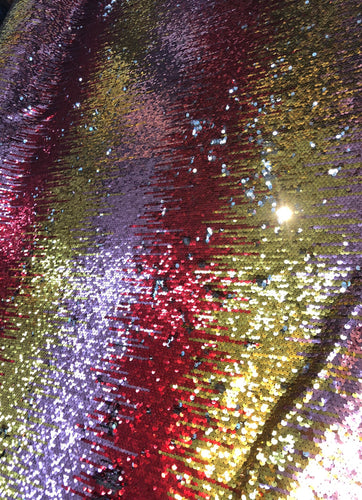 Multi color reversible sequins 54" wide   Beautiful red gold silver color     Fabric sold by the yard