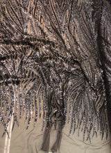 Beautiful sequins design 50&quot; wide    Charcoal grey sequins on grey mesh   Fabric sold by the yard