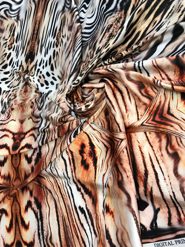 Satin charmeuse digital print 54" wide   Beautiful animal print     Fabric sold by the yard